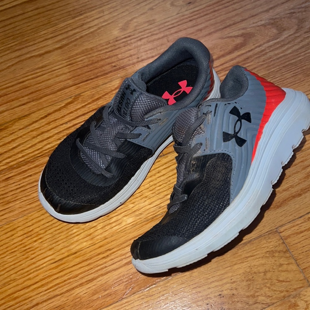 Kids Orange & grey Under Amour sneakers